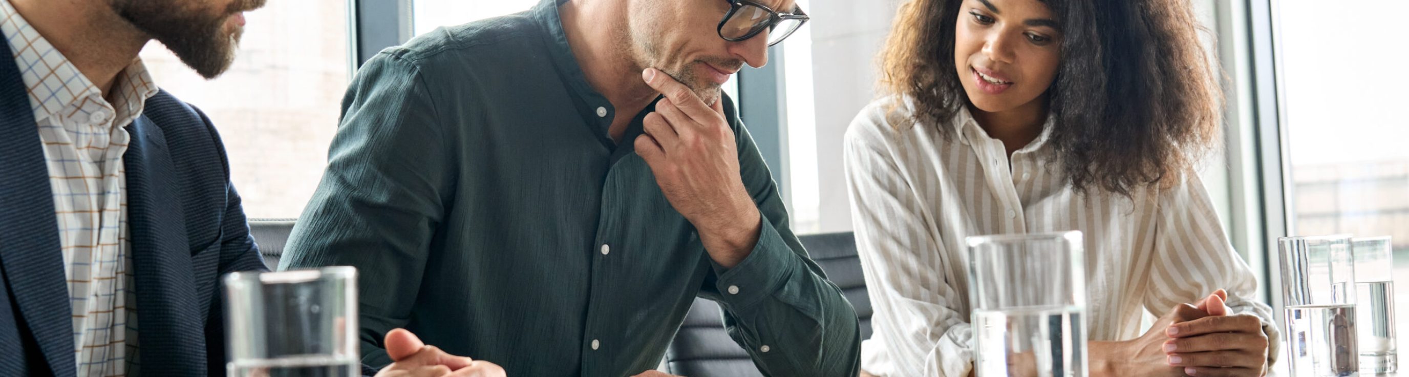 Focused,Doubtful,Mature,Businessman,Reading,Contract,Document,Thinking,Considering,Risks